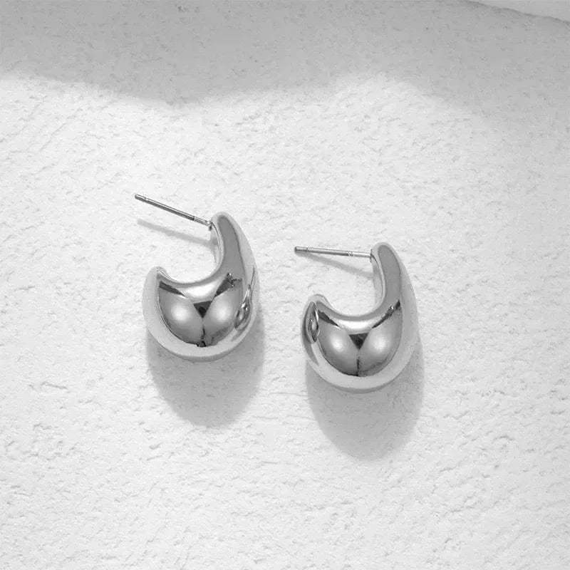 boucles d’oreilles argentées goutte d’eau élégantes pour soirée chic ou mariage invité raffinée