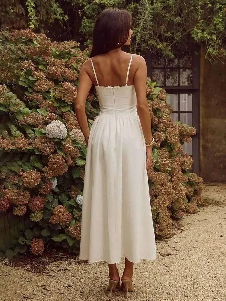 Robe été bohème blanche longue dos nu évasée bretelles fines chic invitée mariage jardin