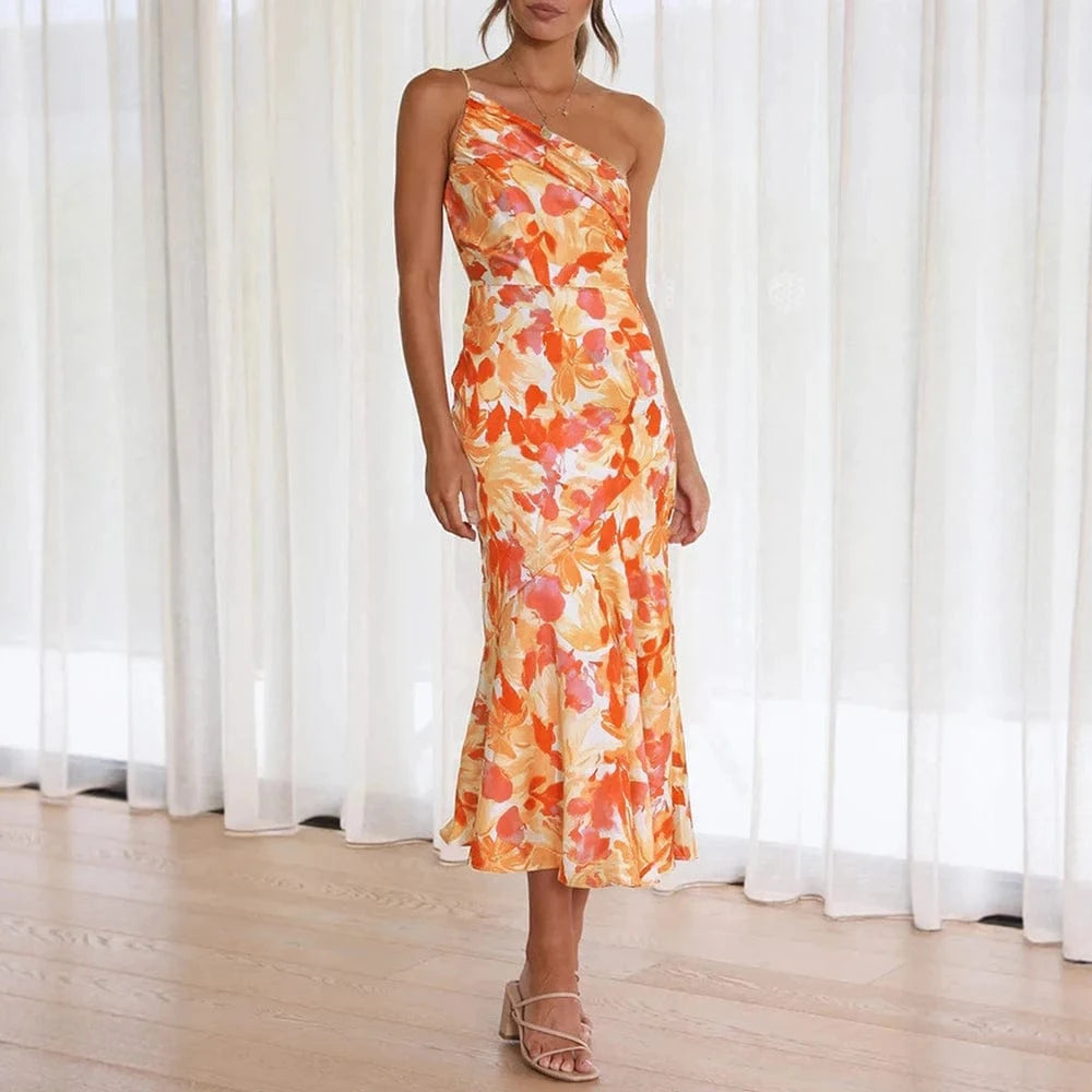 Robe été fleurie longue asymétrique orange et jaune pour mariage invité chic une épaule dénudée élégante
