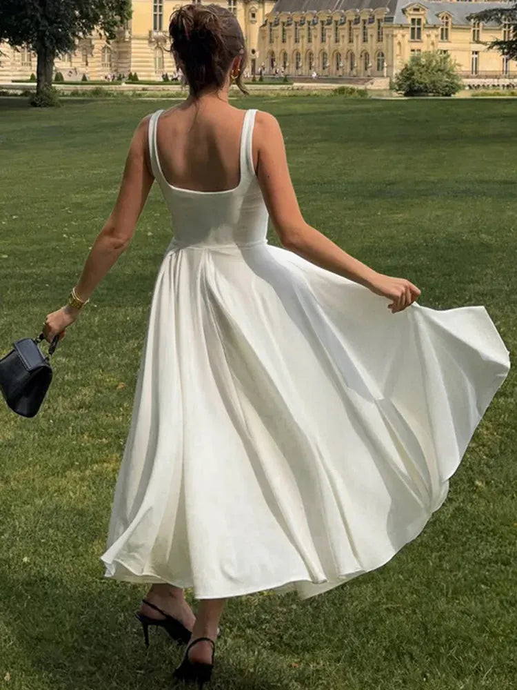 Robe de cocktail midi fluide à bretelles