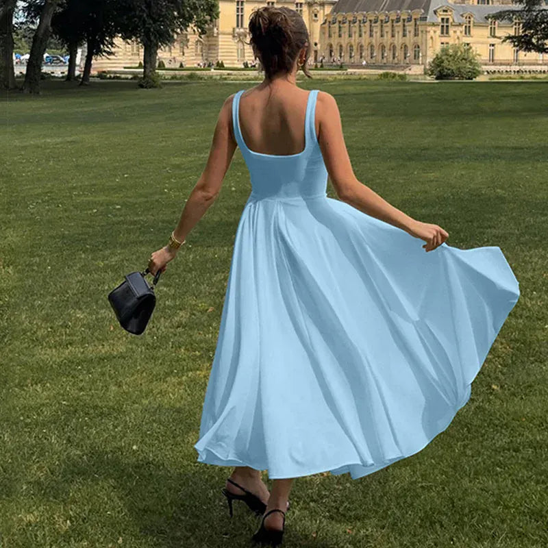 Robe de cocktail midi fluide à bretelles
