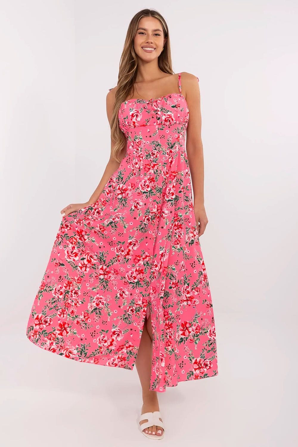 Robe été longue fleurie rose à bretelles fines, coupe évasée style bohème, parfaite pour plage ou cocktail