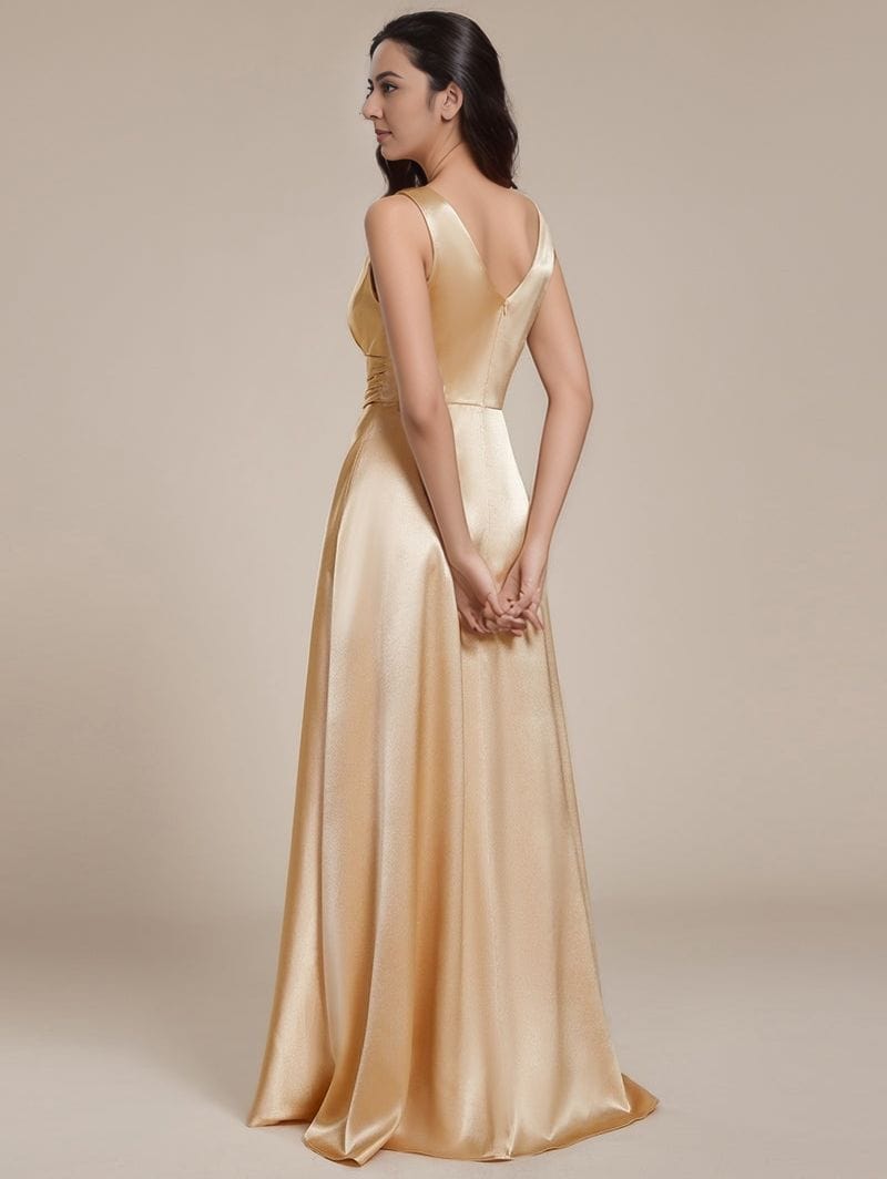 Robe de soirée mariage longue dorée dos nu satin chic silhouette princesse sans manches élégante femme
