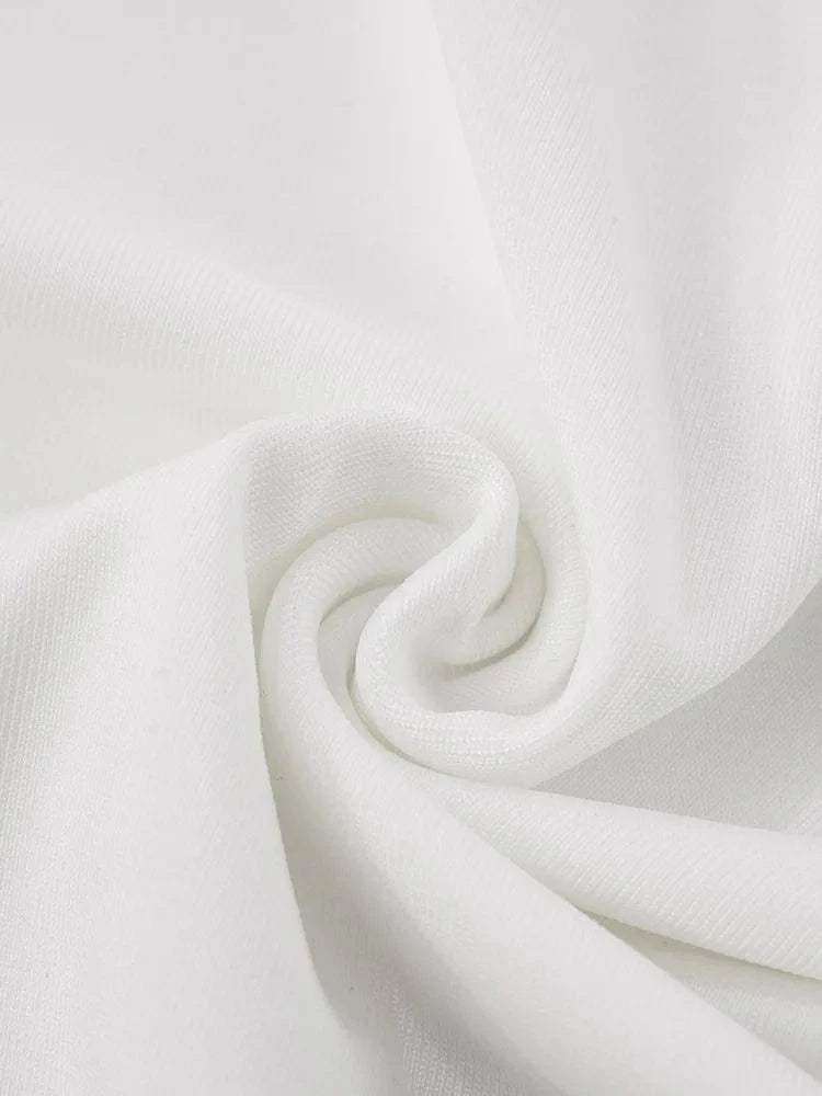 Robe blanche en gaze de coton, matière douce et fluide idéale pour une tenue d’été élégante et confortable