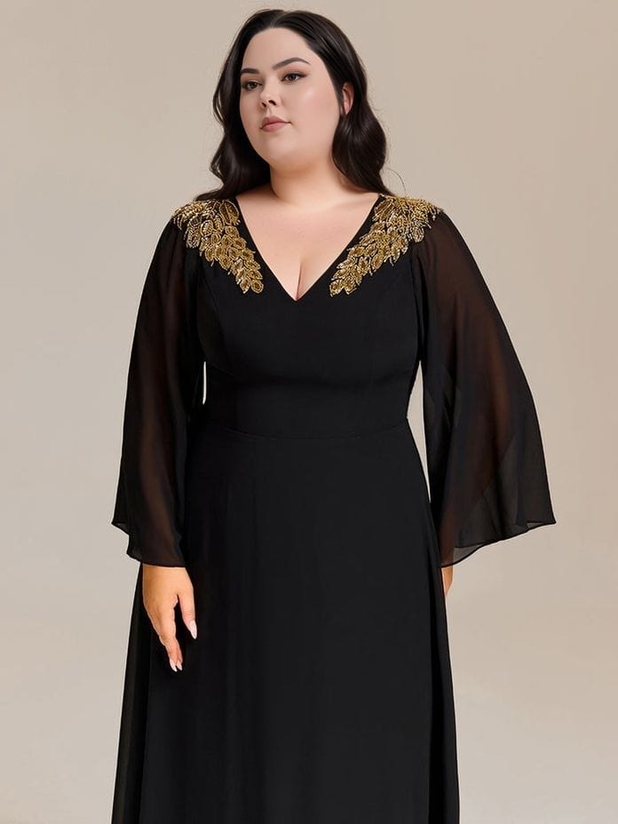 Robe de soirée mariage grande taille noire longue manches longues chic détails dorés col en v élégante