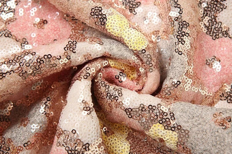 Robe de soirée paillette longue rose dorée tissu fluide chic pour mariage invitée glamour élégante tendance