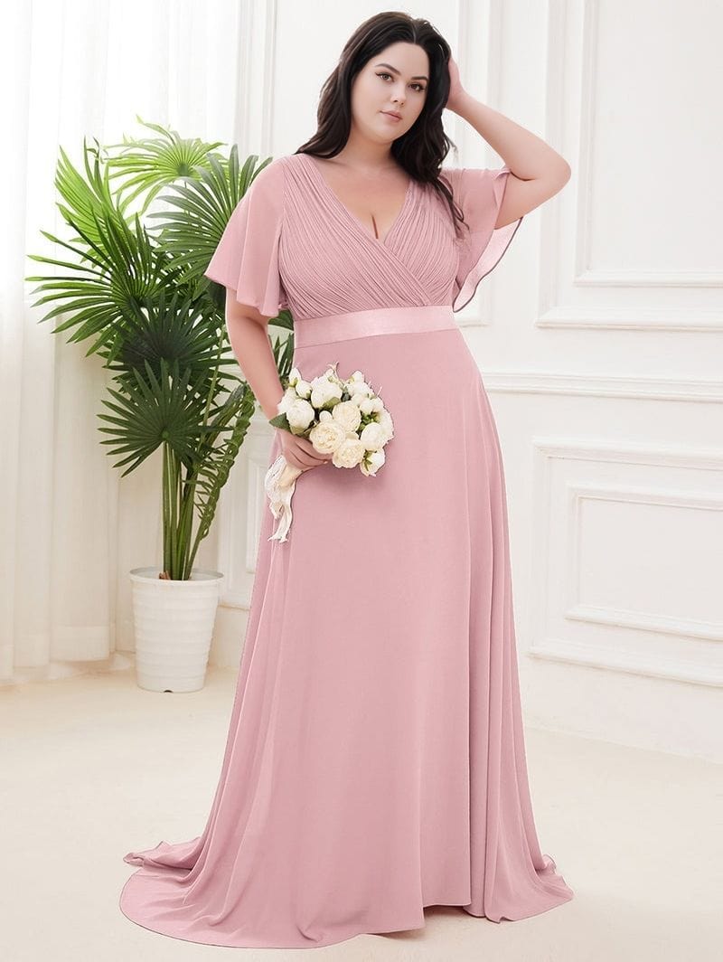 Robe de demoiselle d’honneur grande taille chic longue rose poudré fluide manches courtes bouquet mariage
