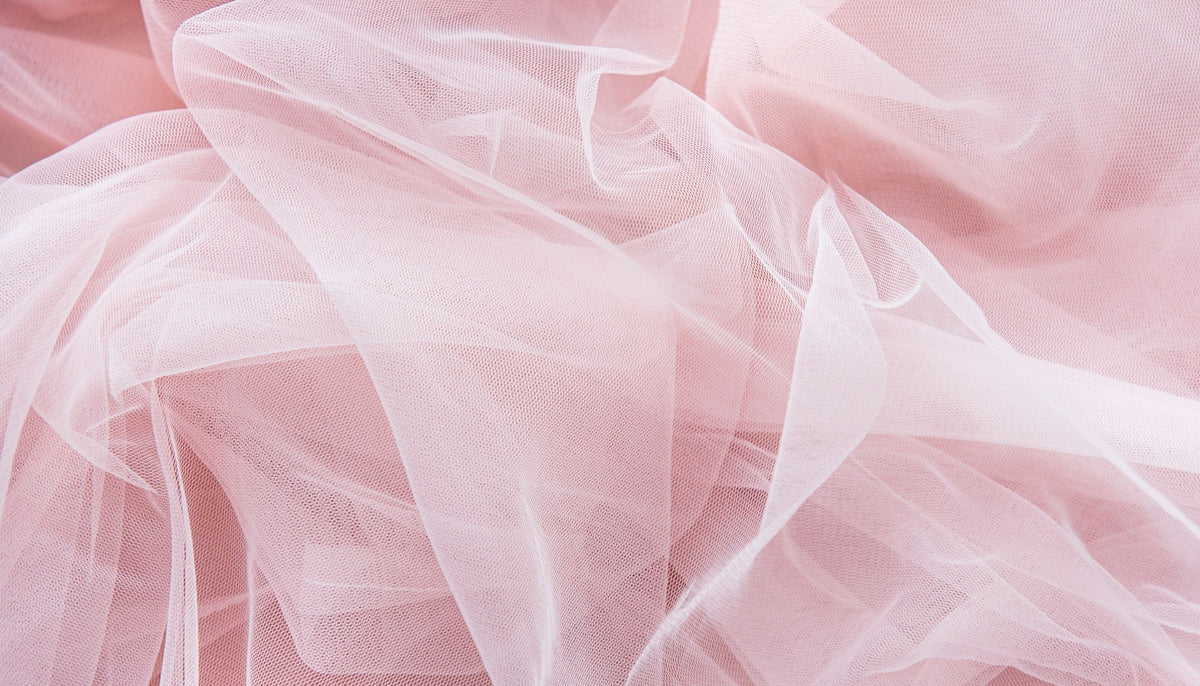 porter une robe rose poudre
