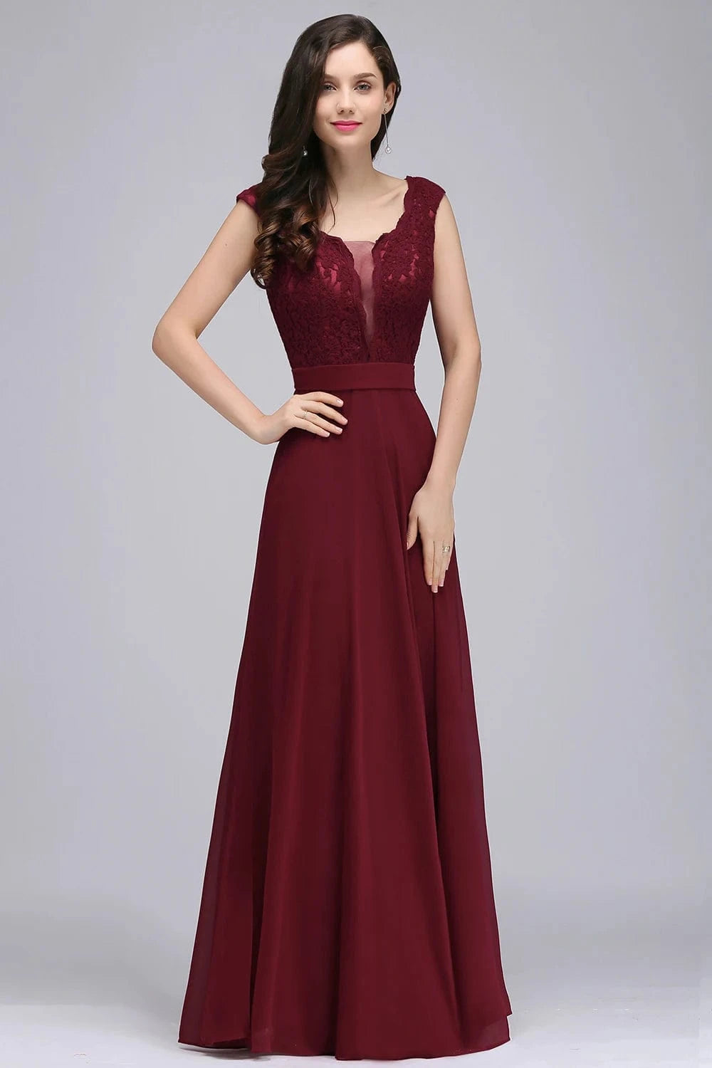 Robe de demoiselle d'honneur chic rose poudré longue trapèze sans manches élégante et raffinée