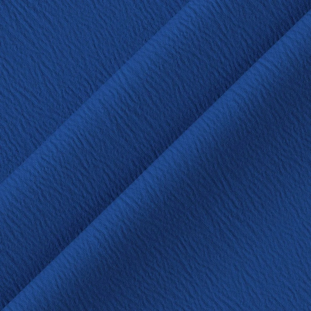 Robe fluide femme bleu tissu texturé élégante idéale pour une soirée chic ou un événement d'été élégant