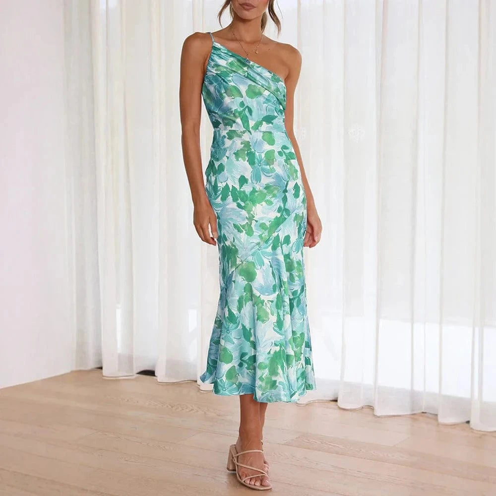 Robe été asymétrique midi verte fleurie chic idéale pour soirée mariage invité ou cocktail tendance