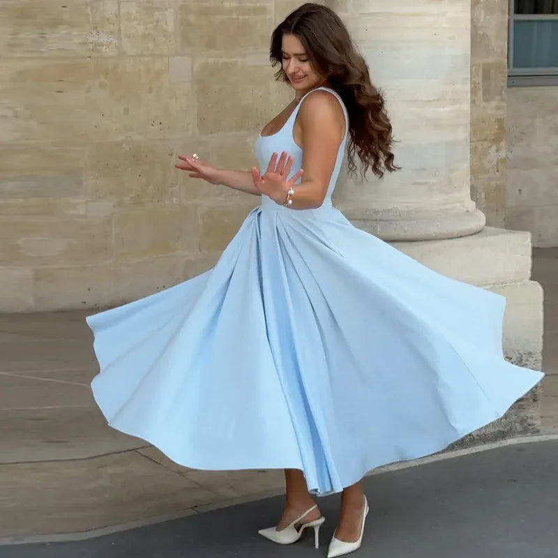 Robe de cocktail midi fluide à bretelles