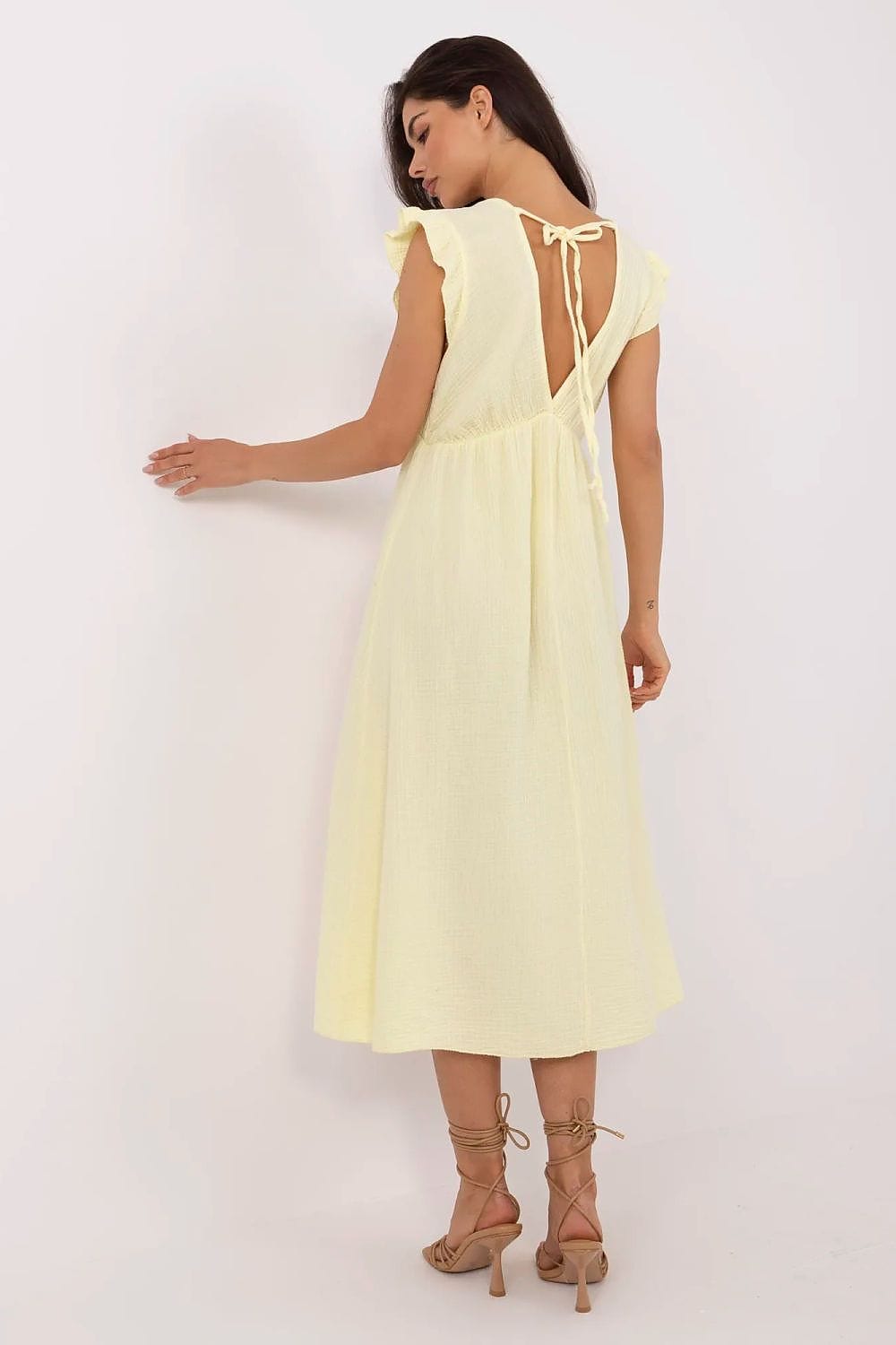 Robe été bohème dos nu midi jaune claire fluide sans manches style chic pour mariage invité