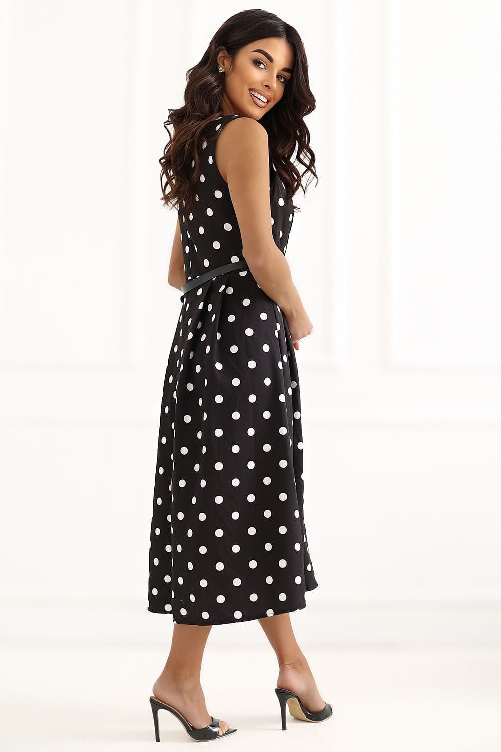 Robe midi noire à pois blancs vintage évasée sans manches élégante pour soirée chic ou cocktail d’été