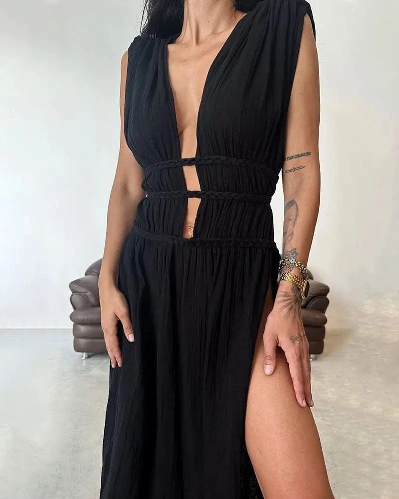 Robe noire longue fendue, décolleté profond, sexy pour soirée chic, sans manches, tissu fluide élégant