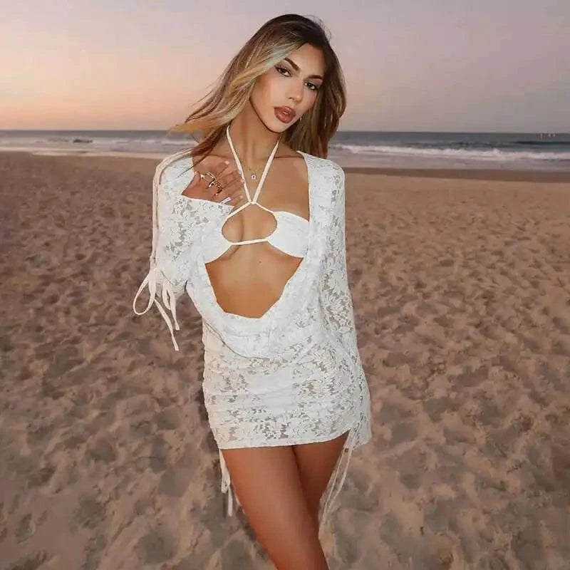 Robe plage courte blanche transparente dos nu sexy décolleté manches longues dentelle tendance été femme