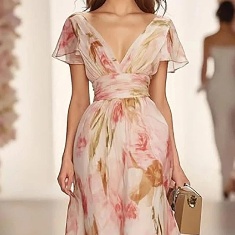 Robe longue fleurie décolleté princesse pour mariage invité chic manches courtes rose poudré élégante