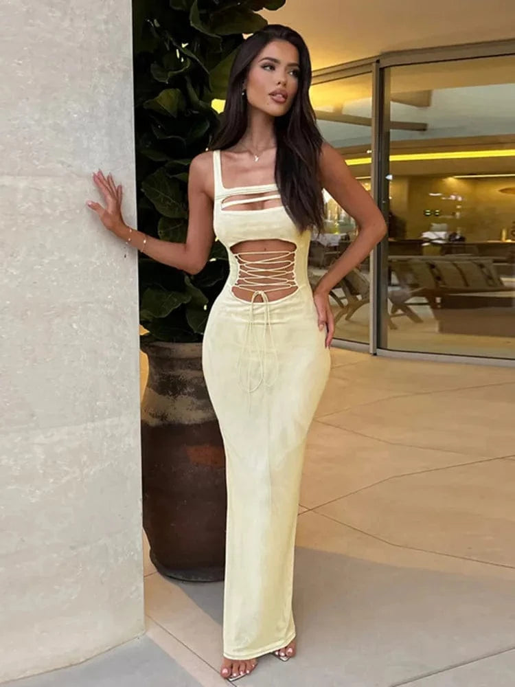 Robe longue moulante soirée chic jaune décolleté sans manches fendue élégante pour événement estival
