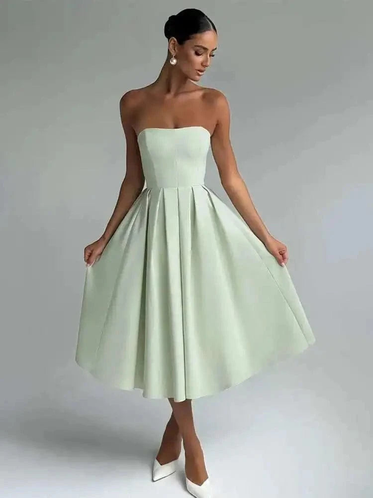 Robe midi bustier évasée verte chic pour soirée mariage invitée élégante sans manches silhouette trapèze