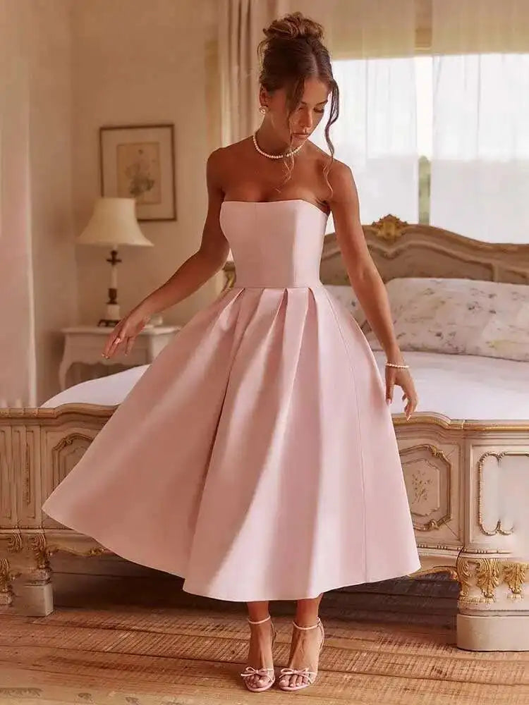 Robe cocktail rose poudré bustier midi élégante trapèze sans manches idéale pour mariage ou soirée chic