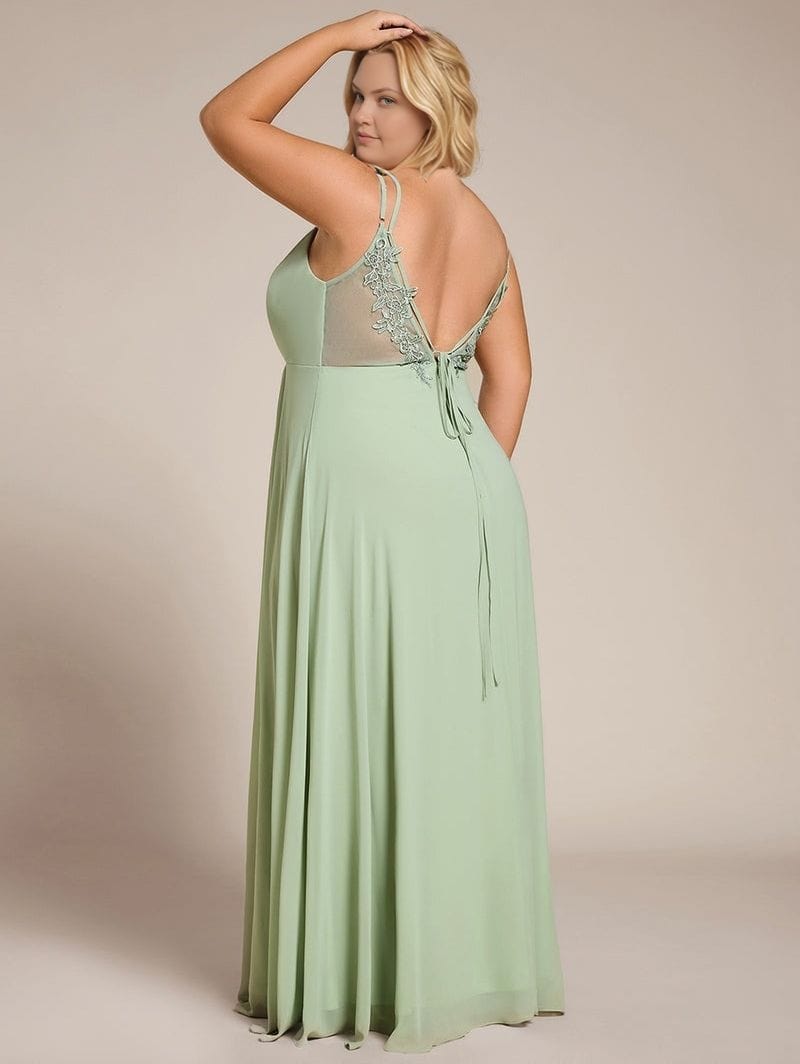 Robe de soirée grande taille longue évasée verte dos nu femme élégante pour mariage invité chic