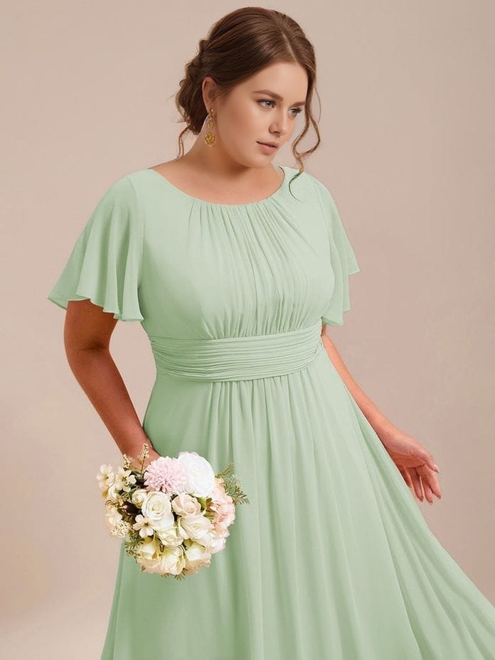 Robe demoiselle d'honneur grande taille bohème longue verte manches courtes élégante avec bouquet de fleurs