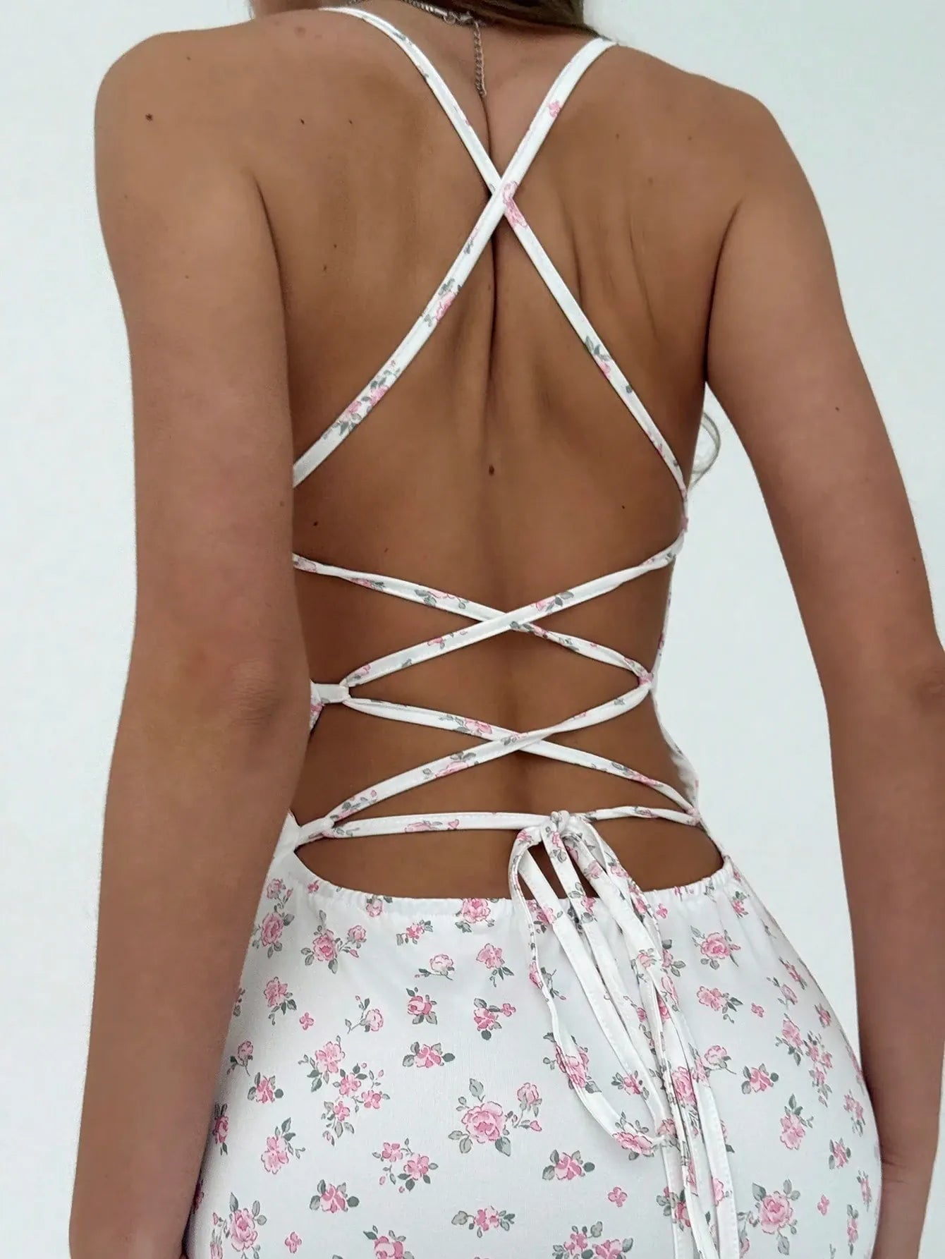 Robe dos nu moulante à imprimé floral
