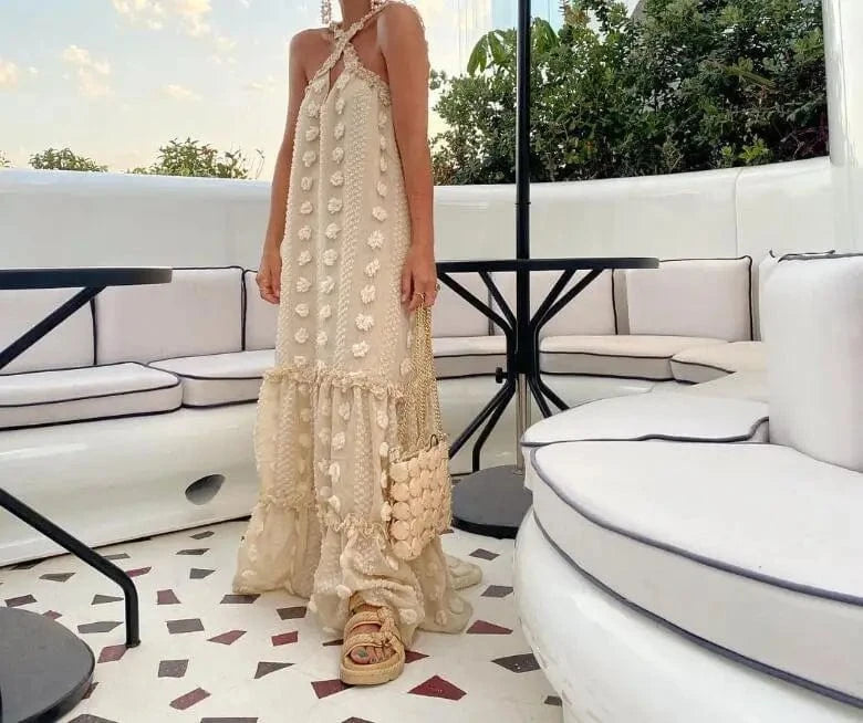 Robe été dos nu chic fleurie longue évasée sans manches idéale pour mariage ou soirée élégante