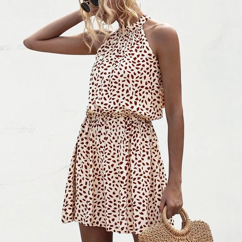 robe été courte fluide à pois col halter pour plage ou mariage champêtre, sans manches et silhouette trapèze