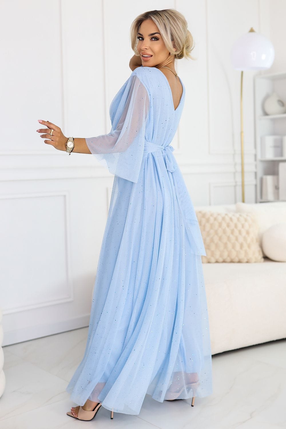 Robe de soirée chic longue bleu fluide dos nu à manches longues pour invitée mariage printemps élégante