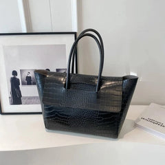 Sac à main crocodile noir