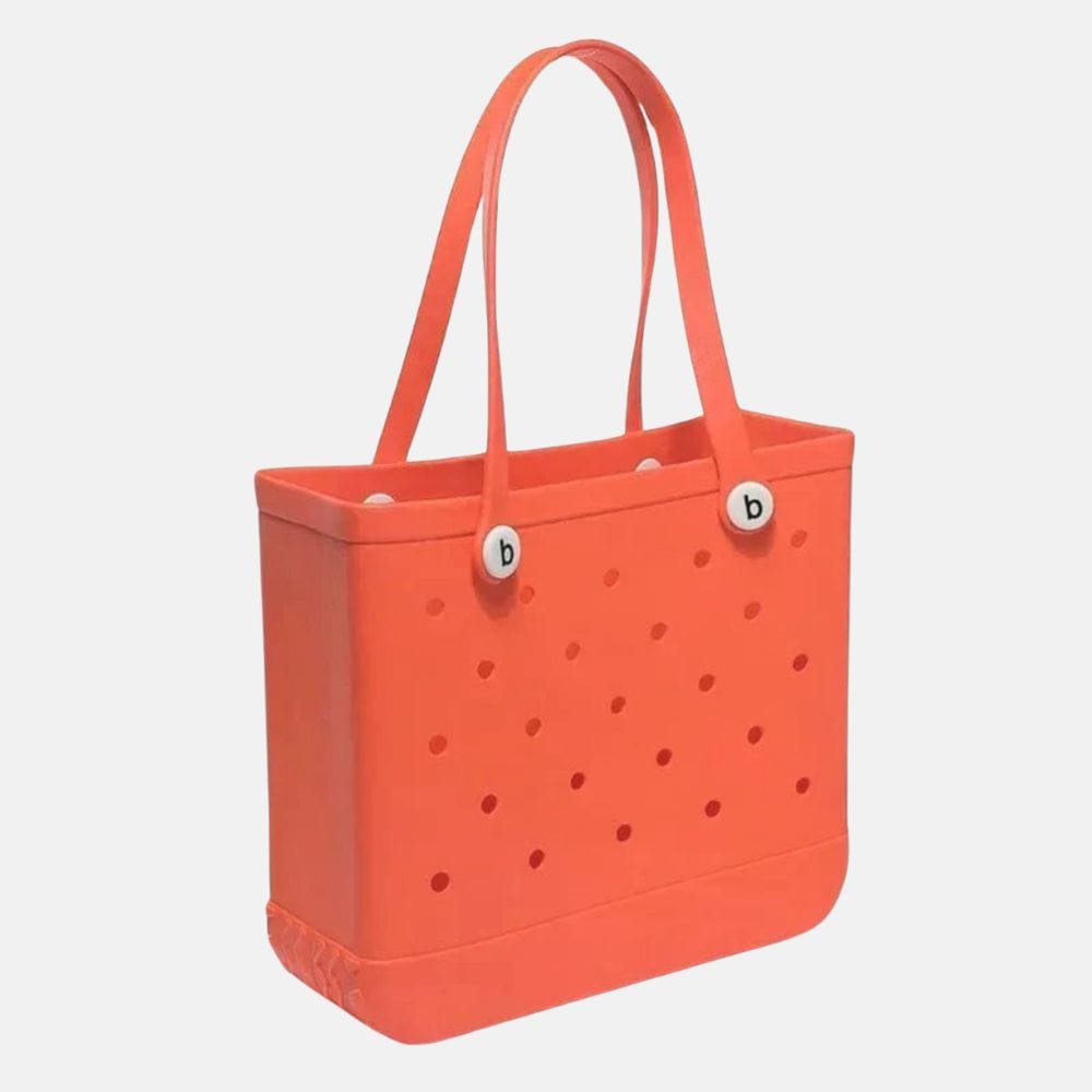 sac de plage orange en tissu léger pour été, accessoire pratique et coloré pour la plage